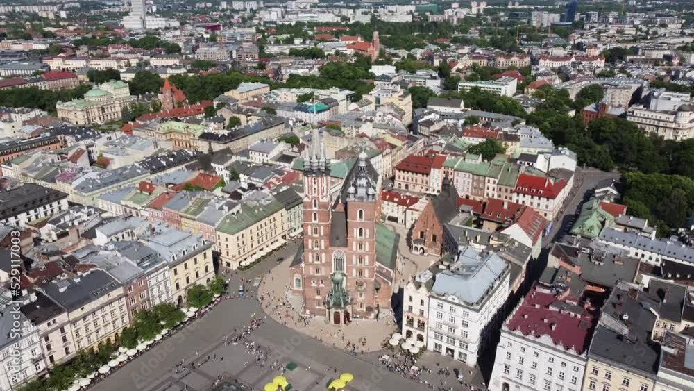 St. Mary's Basilica (Bazylika Mariacka), Clock Tower at the Main Square in Krakow, Poland, a Polish cultural capital, with medieval and renaissance architecture - 4K 30FPS Smooth Tracking Left St. Mary's Basilica (Bazylika Mariacka), Clock Tower at the Main Square in Krakow, Poland, a Polish cultural capital, with medieval and renaissance architecture - 4K 30FPS Smooth Tracking Left