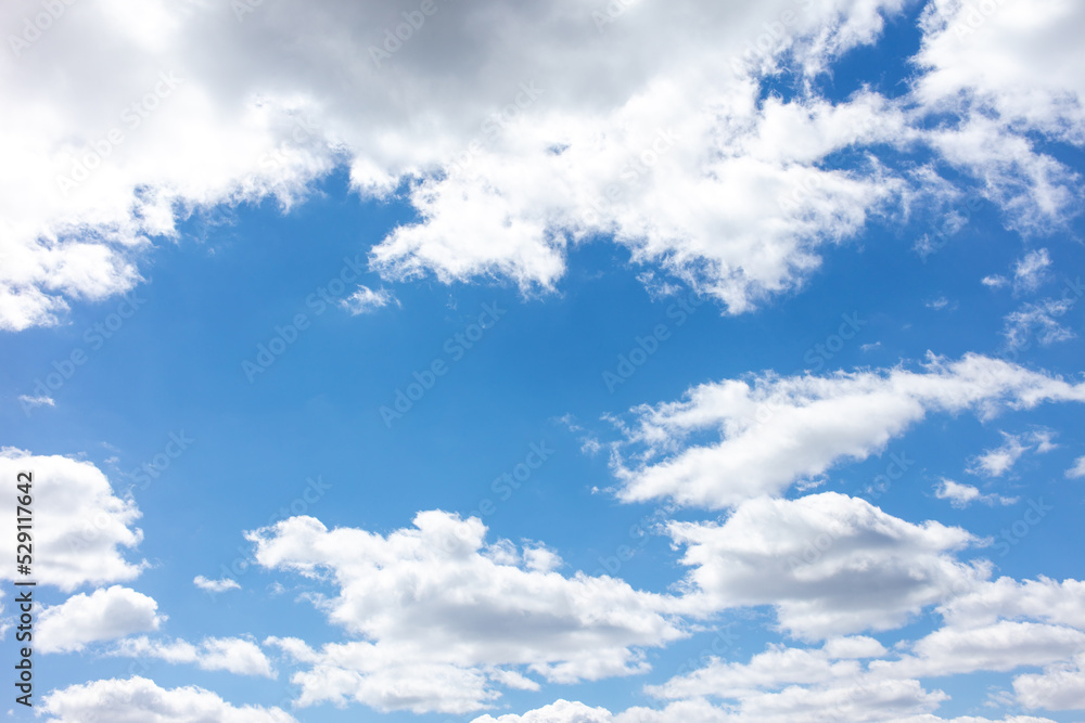 White clouds against the blue sky. White clouds against the blue sky.