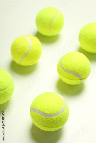Flat lay with tennis balls on white background