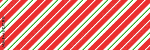 Christmas candy cane striped seamless pattern. Christmas candycane background with red and green stripes. Peppermint caramel diagonal print. Xmas traditional wrapping texture. Vector illustration.