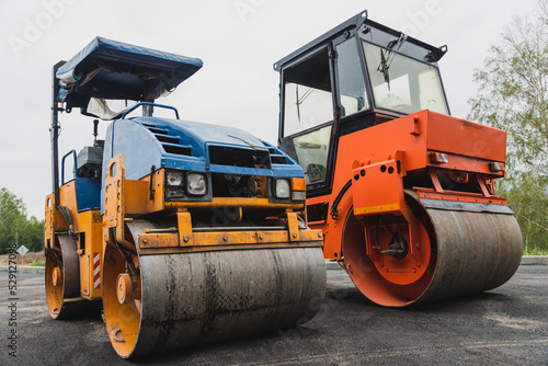Old paver close-up. Road roller. Road construction concept