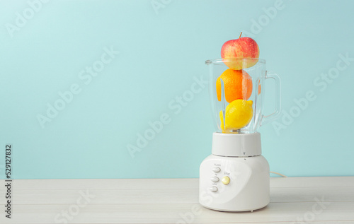 put fruits in the blender machine. Juices, fruit juices, fresh juices, raw juices, etc.ミキサーの中にフルーツを入れる。ジュース、フルーツジュース、果汁、フレッシュジュース、生絞りなど photo