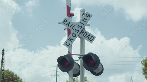 Close up of a railroad crossing sign. photo