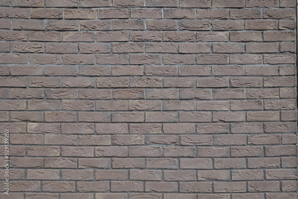 Obraz premium Background - dark chocolate brown brick wall texture