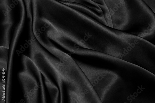 Abstract background luxury cloth or liquid wave or wavy folds of grunge silk texture satin velvet material or luxurious