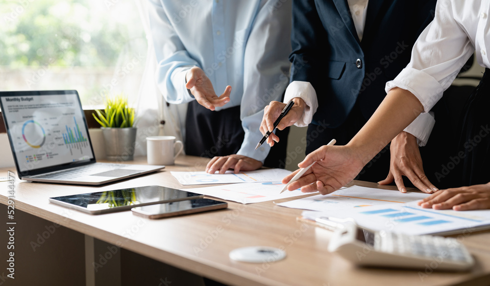 Team work process. Marketing strategy brainstorming. Paperwork and digital in modern office. Team work process. Marketing strategy brainstorming. Paperwork and digital in modern office.