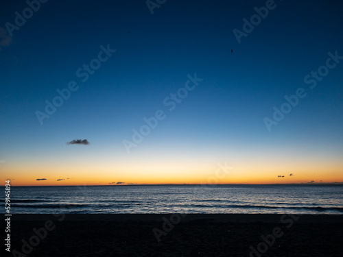 sunset on the beach © Lari