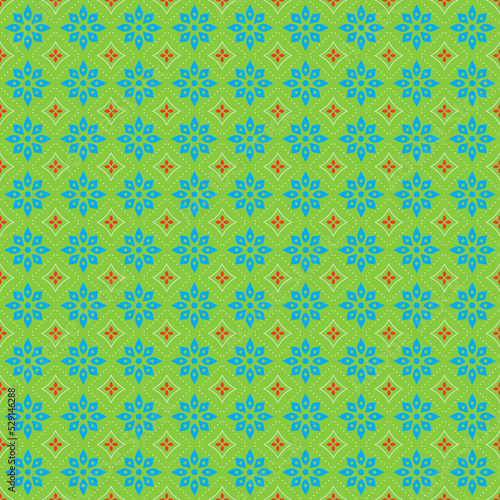 Geometric New Year Christmas Winter holiday pattern with blue snowflakes on a green background