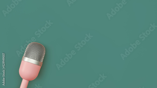 Billede på lærred Pink microphone for podcasts on green background