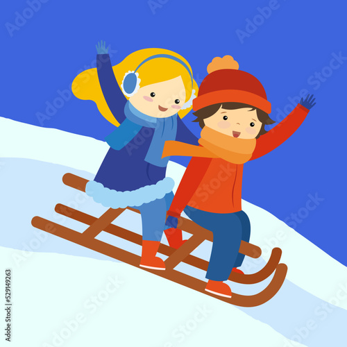 children sledding down the hill