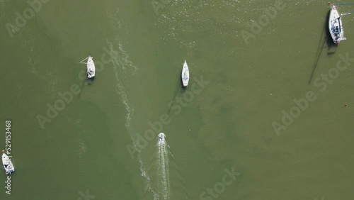 Aerial view of sailing boats docked in Seixal bay near the lagoon, Setubal municipality, Portugal. photo