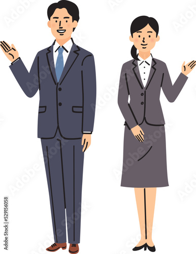 スーツ姿で案内する男女