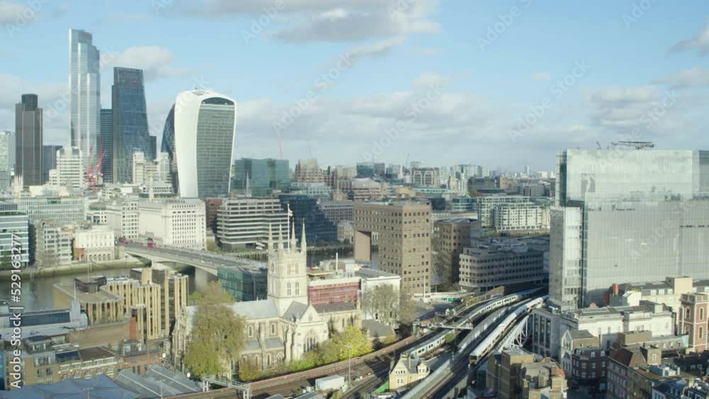 Cinematic establishing shot over Central London on clear morning. Panning through the skyline to The Shard with the historic cityscape in its background. Cinematic establishing shot over Central London on clear morning. Panning through the skyline to The Shard with the historic cityscape in its background.