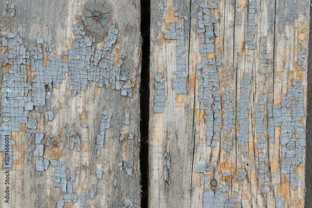 Background, texture of old boards with traces of cracked blue paint Background, texture of old boards with traces of cracked blue paint
