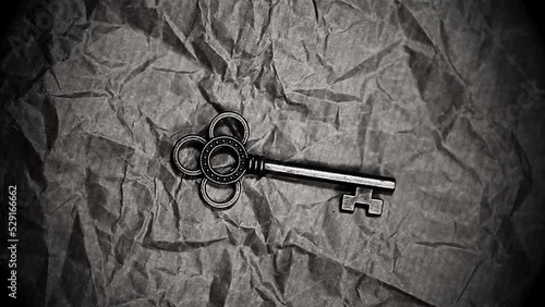 footage of key sharp paper background