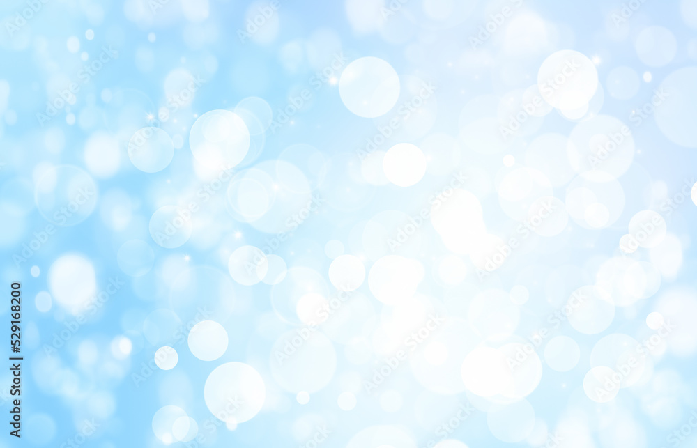 white bokeh on a blue background. Snowfall simulation white bokeh on a blue background. Snowfall simulation