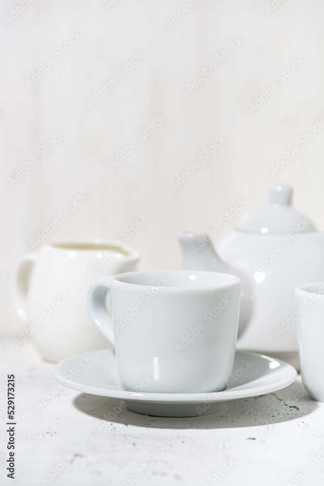 white utensils for tea drinking closeup, vertical white utensils for tea drinking closeup, vertical
