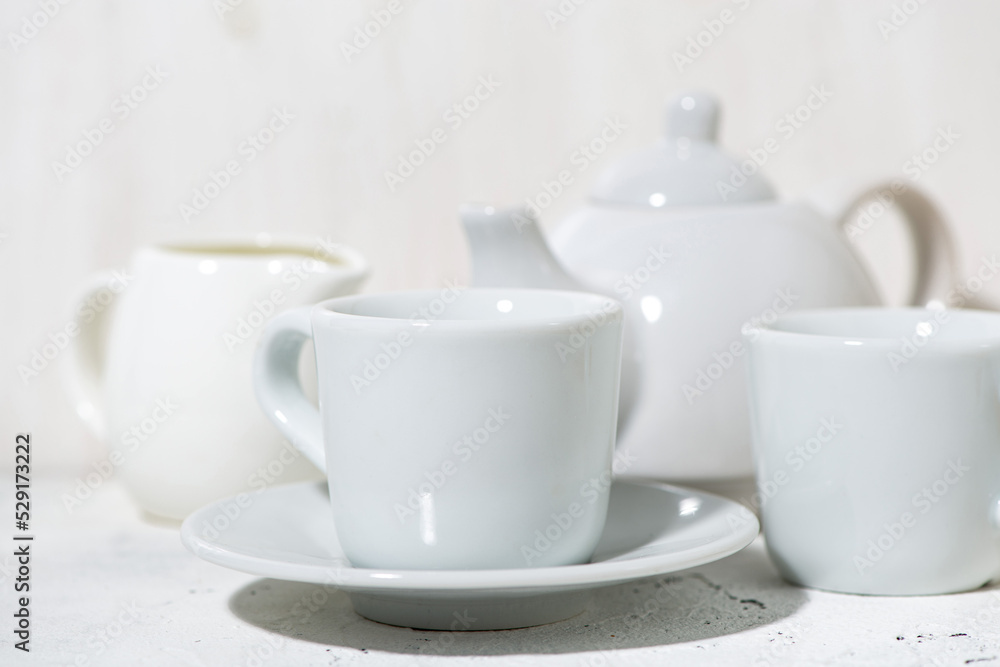white utensils for tea drinking closeup white utensils for tea drinking closeup