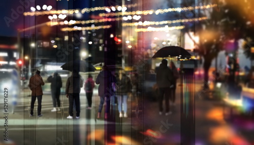 night city light , rainy windows view people walk with umbrella cold season Autumn background urban scene