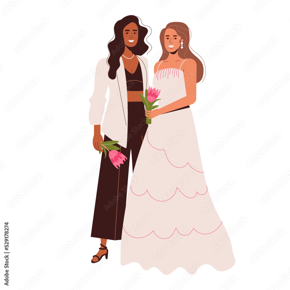 Lesbian girls in love in a white dress and suit. LGBT wedding ceremony with flowers