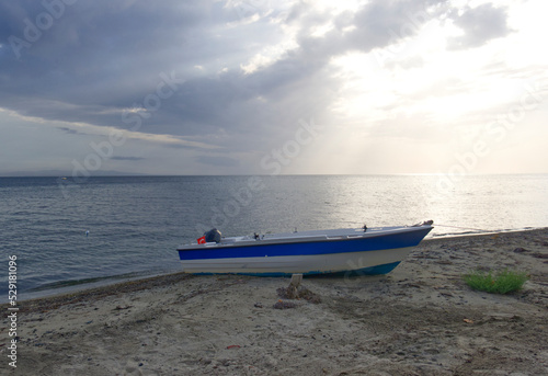 fishing boat on the beach © Emre