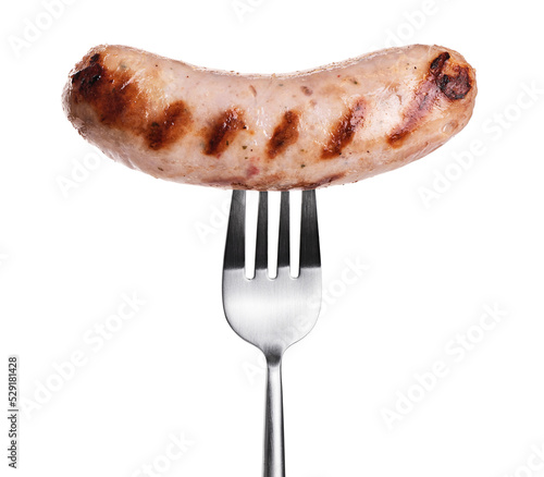 Fork with grilled German, Munich, Bavarian, sausage isolated on white background. With clipping path.