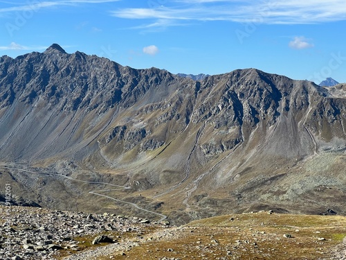 Rocky alpine peak Chlein Schwarzhorn (2967 m) of the Albula Alps mountain range in the Swiss Alps massif, Davos - Canton of Grisons, Switzerland (Kanton Graubünden, Schweiz) photo