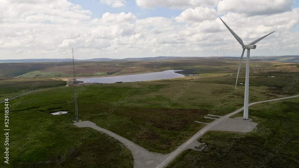 Wind Farm situated on the Yorkshire Moors taken using a drone. Aerial view with wind turbines turning in the wind. Wind Farm situated on the Yorkshire Moors taken using a drone. Aerial view with wind turbines turning in the wind.