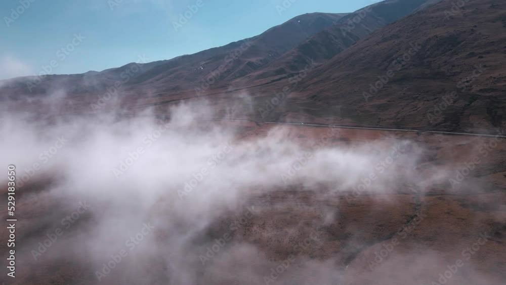 White Foggy Clouds In Front Of Quebrada de Humahuaca Mountains Landscape, North Argentina White Foggy Clouds In Front Of Quebrada de Humahuaca Mountains Landscape, North Argentina