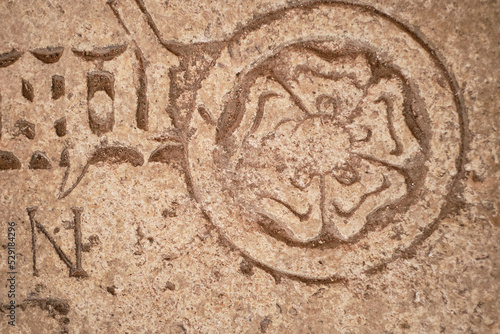 Rose Symbol on a Stone Plate