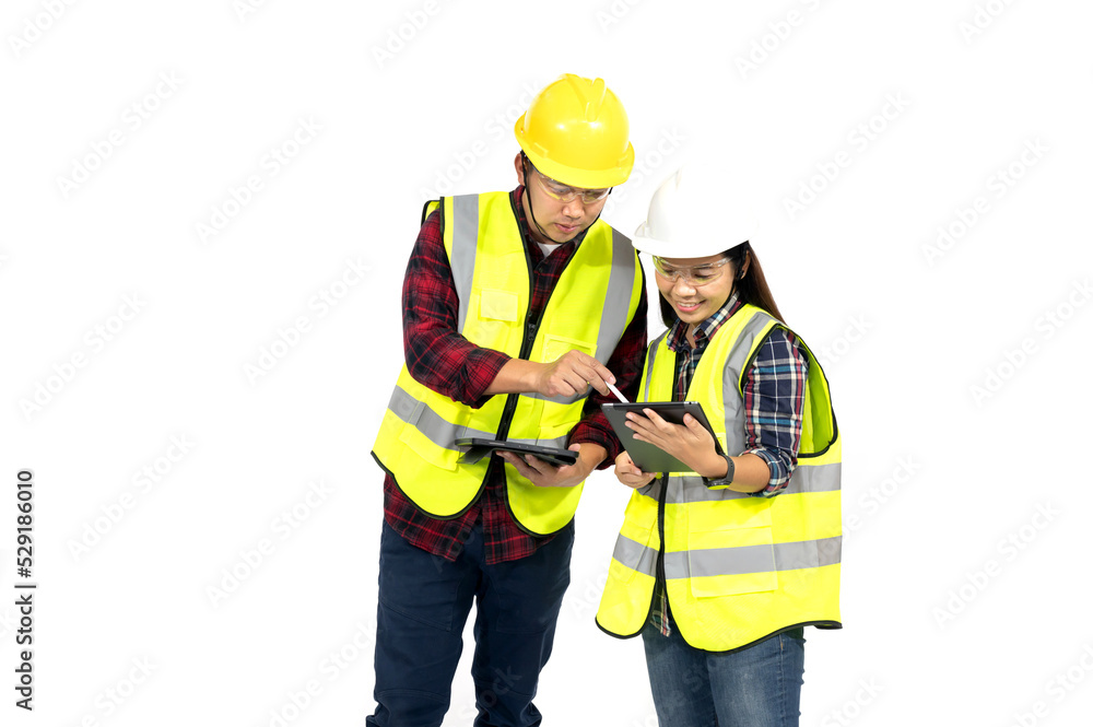 Two workers in uniform pointing something to his coworker over digital tablet isolated on white background. Two workers in uniform pointing something to his coworker over digital tablet isolated on white background.