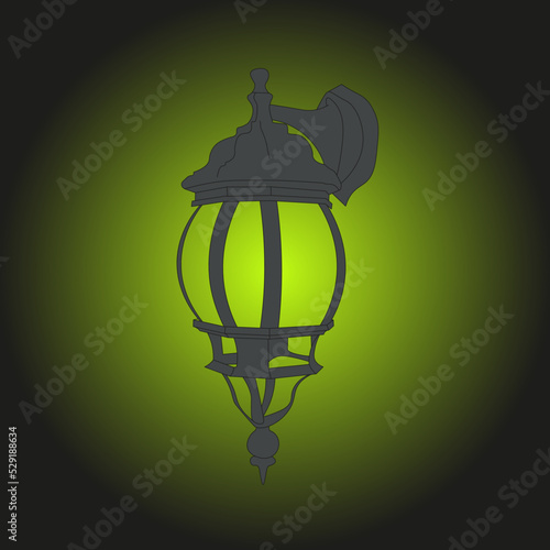 Vintage lamp hanging on the wall, on a black background, glows