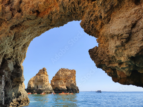 Rock arch in water, Ponta da Piedade rock formations in Algarve, Portugal.