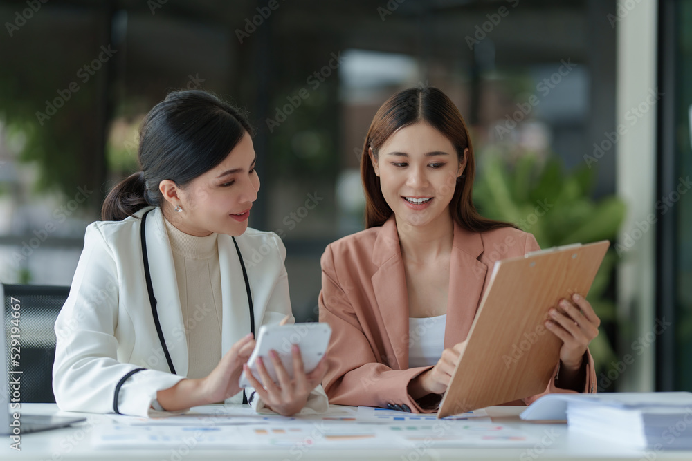 Group of Businesswoman and Accountant checking data document for investigation of corruption account. Anti Bribery concept Group of Businesswoman and Accountant checking data document for investigation of corruption account. Anti Bribery concept