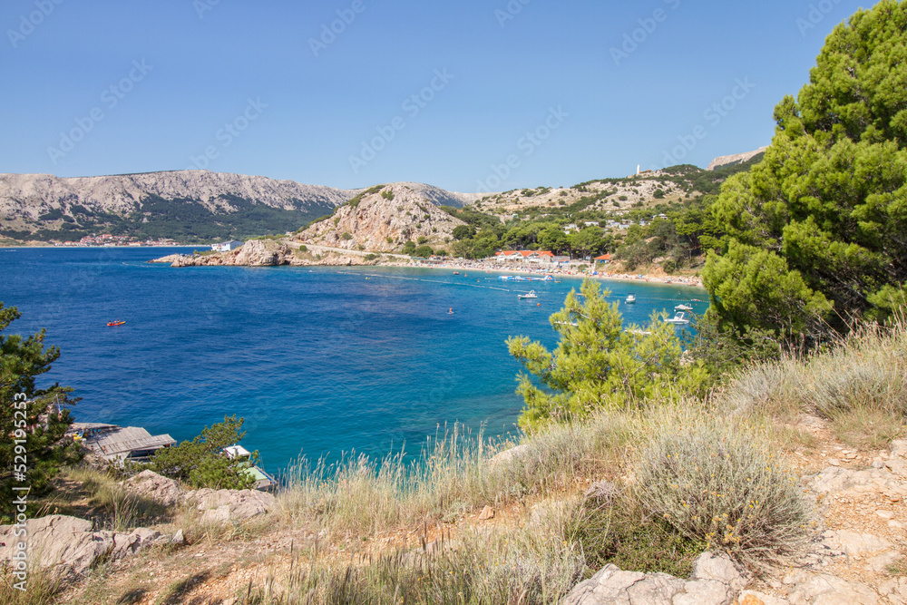 Beautiful seascape of rocky coast and clear waters of the Mediterranean Sea near Baska at the island of Krk, Croatia