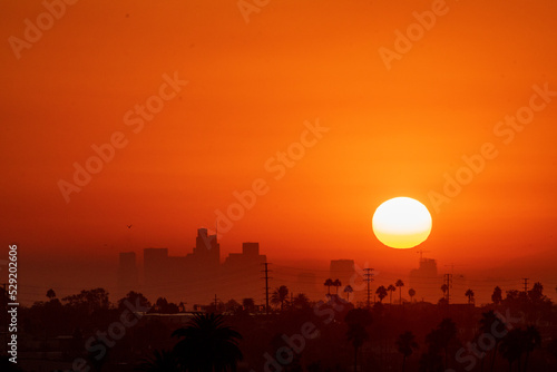 The Sun rises over Los Angeles, California, USA during a dangerous heat wave that has been straining the power grid and causing electrical shortages through Southern California