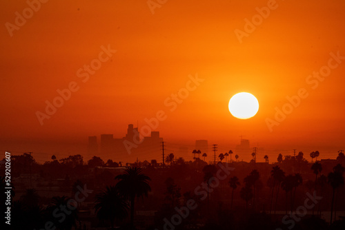 The Sun rises over Los Angeles, California, USA during a dangerous heat wave that has been straining the power grid and causing electrical shortages through Southern California