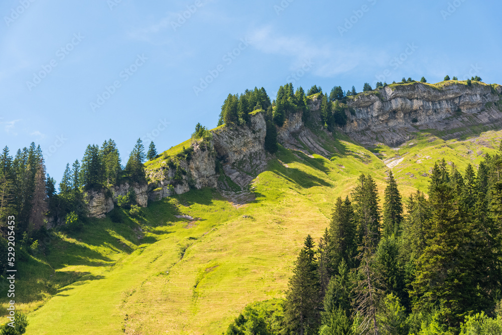 Rocky formation landscape of the peak of a mountain in Glarus, Switzerland