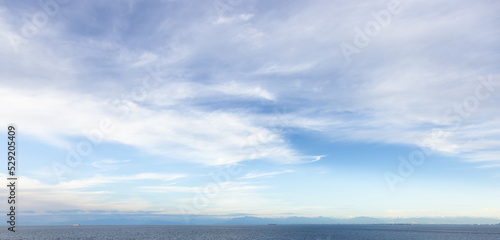 Cloudy Cloudscape during sunny summer Day on the West Coast of Pacific Ocean. British Columbia  Canada. Sunset Sky