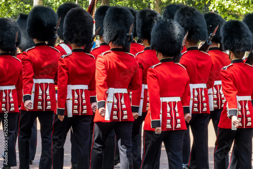 Fototapeta Queen royal british guards in red uniforms during guards changing parade on the