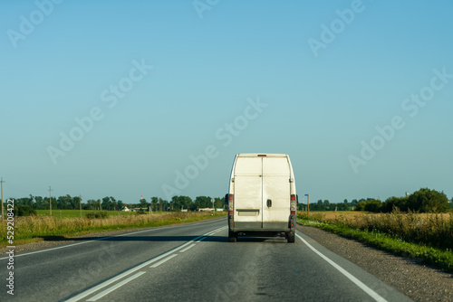 Car minibus driving on the road rear view © kulkann
