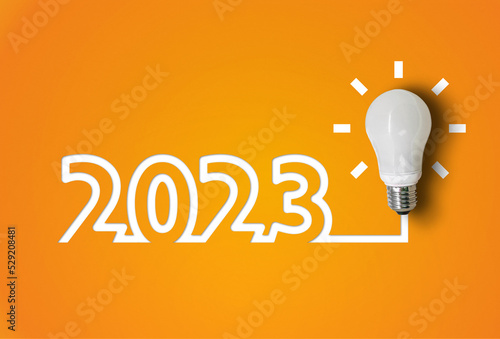 happy new year 2023. year 2023 with light bulb. creativity inspiration ,planning ideas concept 