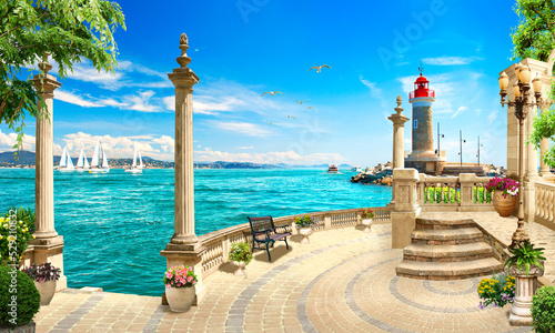 Photographie The sea embankment with a lighthouse and yachts