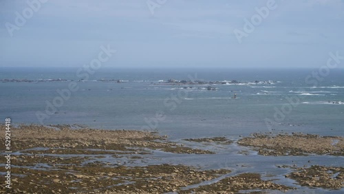 A view from the top of the Eckmül lighthouse on the Atlantic and the rocky coast. photo