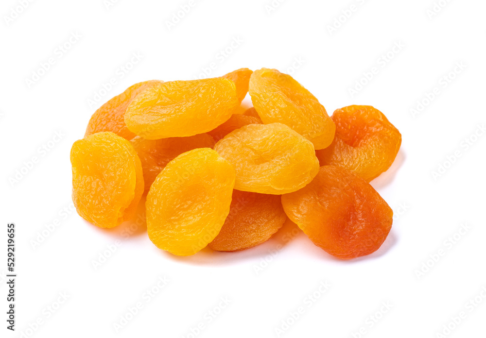 A group of dried apricots isolated over white background A group of dried apricots isolated over white background