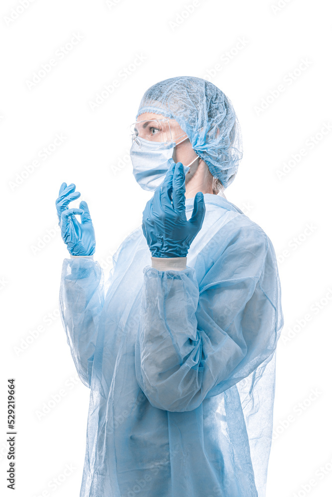female doctor in medical mask on the face and gloves on a white background