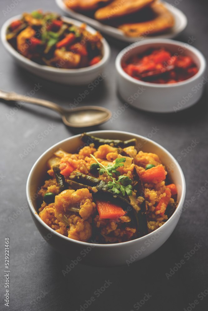 Bengali Bhog food for Indian Hindu Durga Puja or pooja festival. Khichadi, labra, tomato chutney Bengali Bhog food for Indian Hindu Durga Puja or pooja festival. Khichadi, labra, tomato chutney