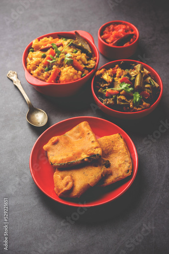 Bengali Bhog food for Indian Hindu Durga Puja or pooja festival. Khichadi, labra, tomato chutney photo