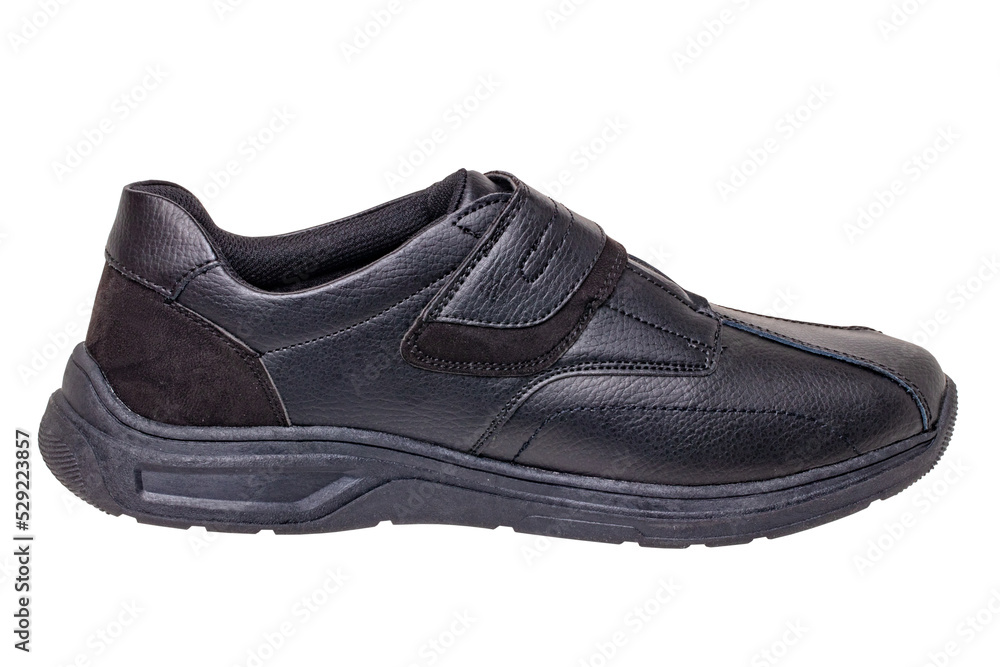 Mans black shoes. Close-up of a single of black sneakers or sport shoes isolated on a white background. Clipping path. Elegant and trendy mens footwear. Macro. Mans black shoes. Close-up of a single of black sneakers or sport shoes isolated on a white background. Clipping path. Elegant and trendy mens footwear. Macro.