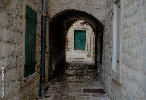 Fototapeta Naklejka Na Ścianę i Meble -  Architecture. Streets of the old city. Kotor. Montenegro.